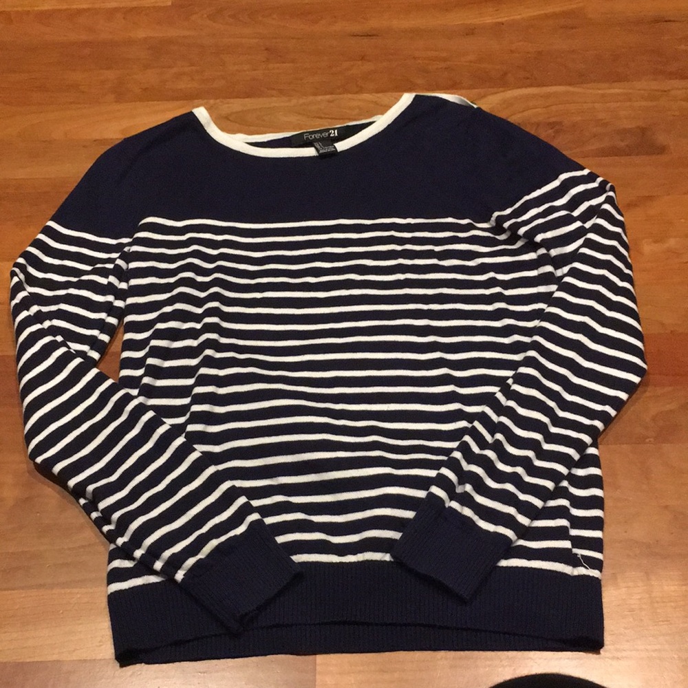 Blue and white striped sweater.